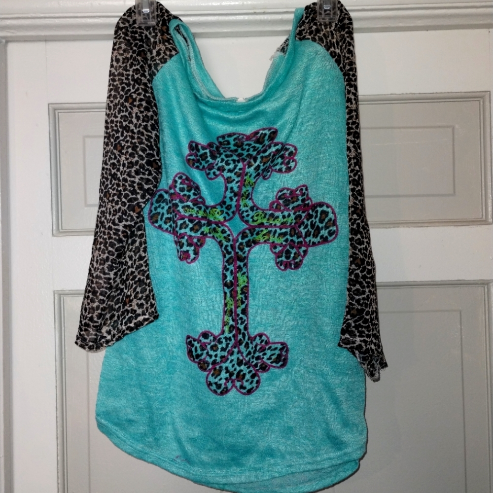 unique cross t-shirt with leopard print sleeves, available 
